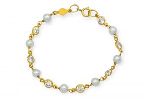 Pulsera oro 7 perlas circonita niña