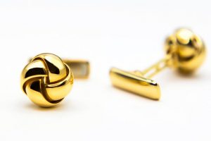 Gemelos oro nudo rígido