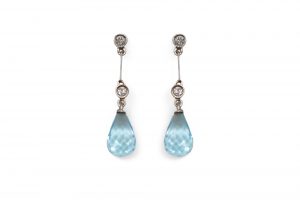 Pendientes billantes y topacio